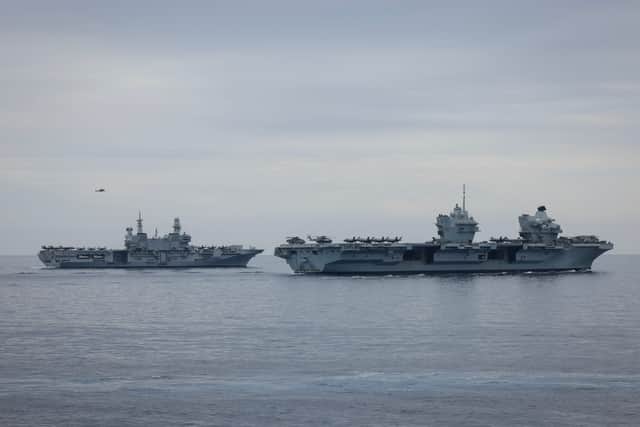 HMS Prince of Wales has combined forces with an Italia strike group for a major exercise in the Mediterranean. Pictured: (L/R) Italian aircraft Carrier ITS Cavour and HMS Prince of Wales.