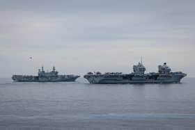 HMS Prince of Wales has combined forces with an Italia strike group for a major exercise in the Mediterranean. Pictured: (L/R) Italian aircraft Carrier ITS Cavour and HMS Prince of Wales.