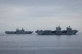 HMS Prince of Wales has combined forces with an Italia strike group for a major exercise in the Mediterranean. Pictured: (L/R) Italian aircraft Carrier ITS Cavour and HMS Prince of Wales.