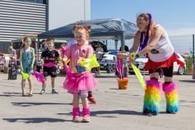 Youngsters join in with the FitnFunkey dance group. Picture: Mike Cooter (110525)
