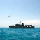 Portsmouth-based Royal Navy minehunter HMS Middleton joined forces with American, Kuwaiti and Iraqi forces to conduct a rescue exercise in the Gulf. Picture: A Kuwaiti police helicopter flies past HMS Middleton