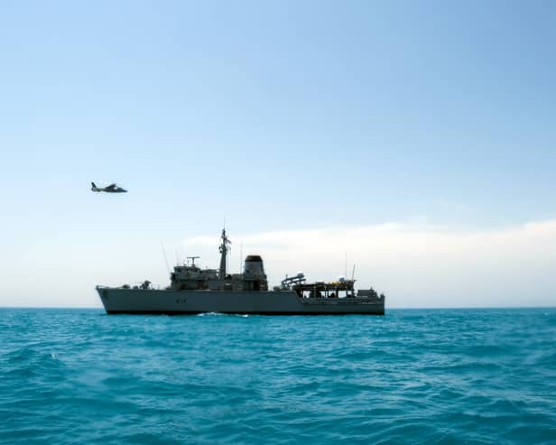Portsmouth-based Royal Navy minehunter HMS Middleton joined forces with American, Kuwaiti and Iraqi forces to conduct a rescue exercise in the Gulf. Picture: A Kuwaiti police helicopter flies past HMS Middleton