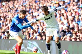 Tyler Goodrham battling Pompey's Jordan Williams.