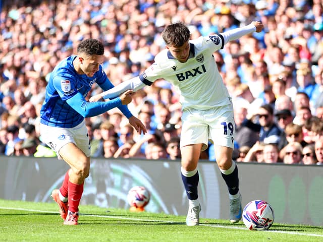 Tyler Goodrham battling Pompey's Jordan Williams.