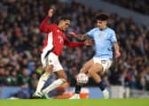 Haji Mnoga challenges Manchester City's Nico O'Reilly in the FA Cup this season. Picture: Carl Recine/Getty Images)