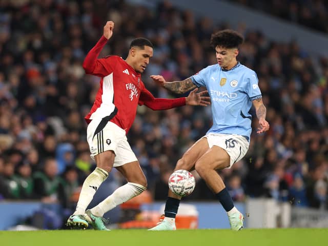 Haji Mnoga challenges Manchester City's Nico O'Reilly in the FA Cup this season. Picture: Carl Recine/Getty Images)