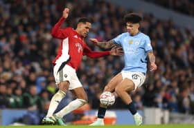 Haji Mnoga challenges Manchester City's Nico O'Reilly in the FA Cup this season. Picture: Carl Recine/Getty Images)