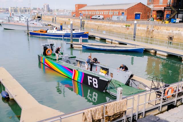 Falklands War Landing Craft F8 wrapped in Pride colours at Portsmouth Historic Dockyard.