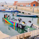 Falklands War Landing Craft F8 wrapped in Pride colours at Portsmouth Historic Dockyard.