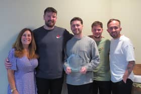 The Portsmouth Tennis Centre team celebrate being awarded the prestigious Tennis Opened Up Award at the LTA Tennis Awards.