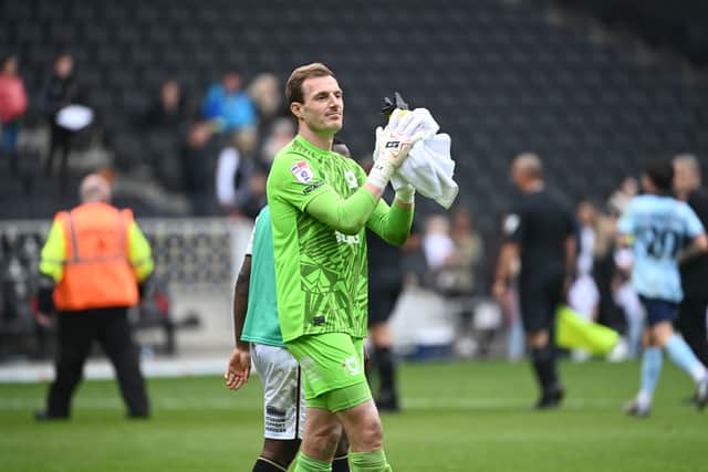 Former Pompey keeper Craig MacGillivray has created a clean sheet record with MK Dons. Picture: Jane Russell