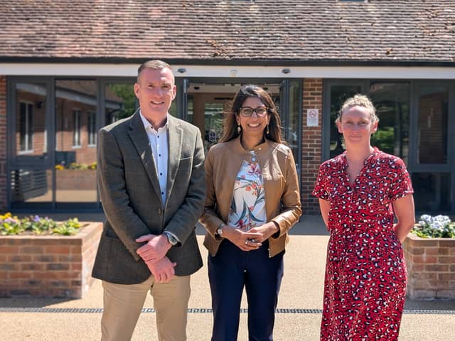 Jo Fricker, Iain Camero and Suella Braverman outside Rowans Hospice