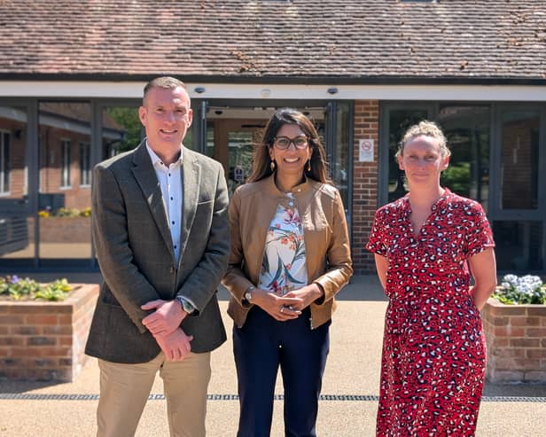 Jo Fricker, Iain Camero and Suella Braverman outside Rowans Hospice