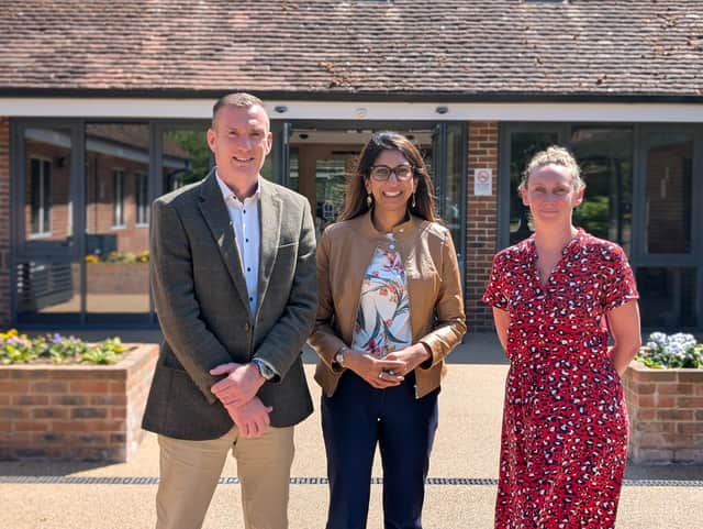 Jo Fricker, Iain Camero and Suella Braverman outside Rowans Hospice