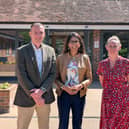 Jo Fricker, Iain Camero and Suella Braverman outside Rowans Hospice