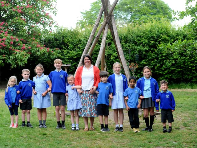 Hambledon Primary School in Church Lane, Hambledon, has received a positive result in their recent Ofsted report.


Pictured is: Adrienne Corr, headteacher of Hambledon Primary School with some of the children.

Picture: Sarah Standing (130525-6726)