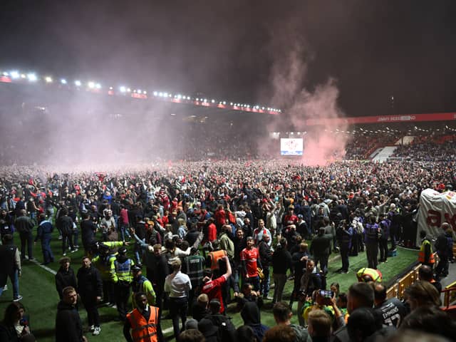 Charlton fans invaded the pitch at The Valley after their side's 1-0 win over Wycombe in the second leg of their League One play-off semi-final