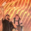Austrian singer Johannes Pietsch, known as JJ representing Austria with the song "Wasted Love" celebrates with the 2025 Eurovision Song Contest trophy after winning the grand final at the St. Jakobshalle arena in Basel on May 18, 2025.