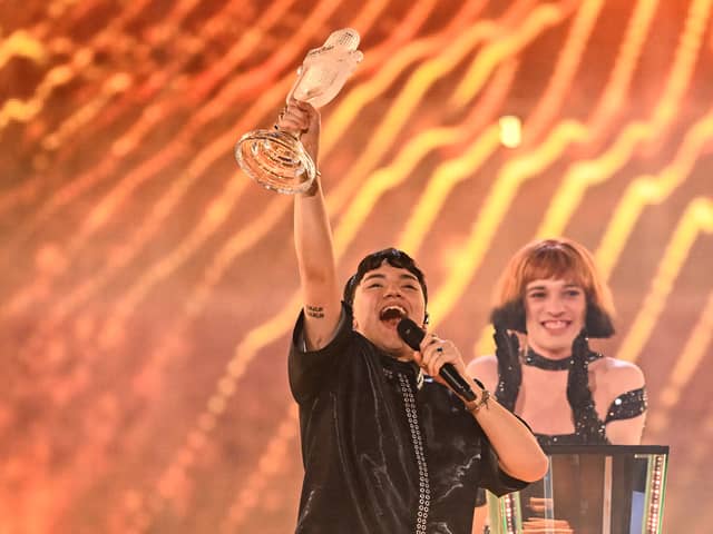 Austrian singer Johannes Pietsch, known as JJ representing Austria with the song "Wasted Love" celebrates with the 2025 Eurovision Song Contest trophy after winning the grand final at the St. Jakobshalle arena in Basel on May 18, 2025.