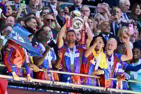 Former Pompey boy Joel Ward lifts the FA Cup for Crystal Palace after their Manchester City win. Pic: Getty