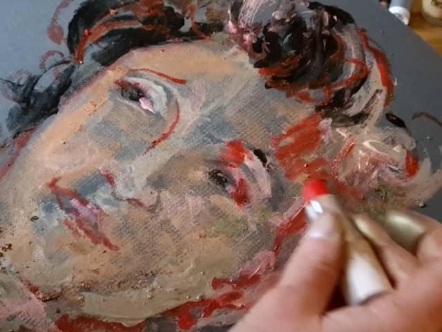 A portrait drawn with makeup by Margit van der Zwan.