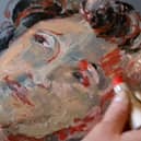 A portrait drawn with makeup by Margit van der Zwan.