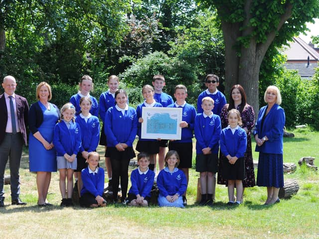 King's Academy Gomer in Pyrford Close, Gosport, has received a positive result in its recent Ofsted report.


Pictured is: (left and second left) Nick Cross, CEO of King's Group Academies, Georgina Mulhall, executive headteacher, (second from right and right) Karen Digby, associate headteacher and Claire-Louise West, director of primary for the King's Group Academies with head boy and head girl, deputy head boy and head girl, house captains and school councillors.Picture: Sarah Standing (190525-6968)