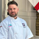 Armed Forces Caterer of the Year Joe Whitlock, from Gosport, outside the RN Leadership Academy in Portsmouth.