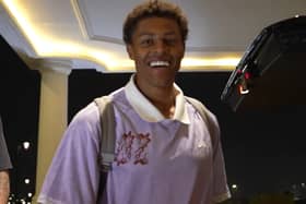 Kusini Yengi was all smiles as he reported for international duty  with the Socceroos on Tuesday