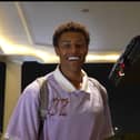 Kusini Yengi was all smiles as he reported for international duty  with the Socceroos on Tuesday