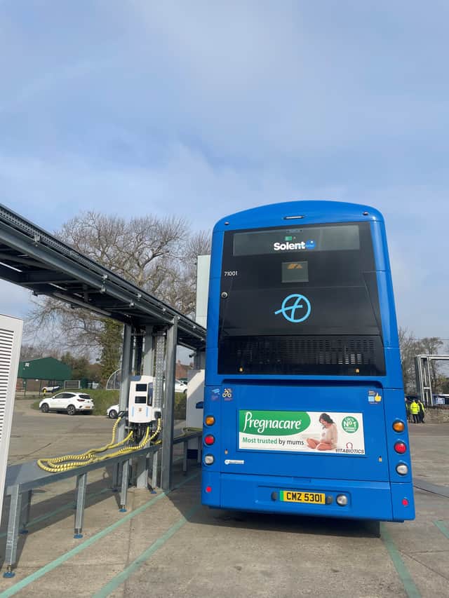 A new 'repower' electric bus charging at the First Bus depot in Hoeford