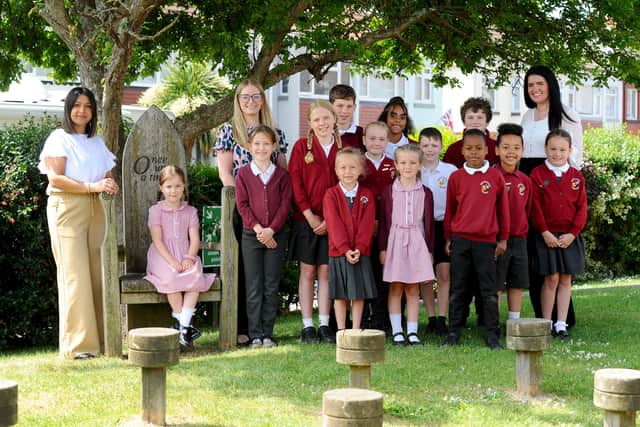 Brockhurst Primary School in Avery Lane, Gosport, have received a positive outcome in their recent Ofsted report. 

Pictured is: (left) Shobana Kohli, headteacher, (middle) Amy Church, assistant headteacher and (right) Amy Hogan, assistant headteacher, with some of the children.

Picture: Sarah Standing (220525-7263)