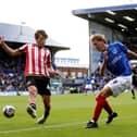 Pompey's Jacob Farrell, right, with Sheffield United's Sydie Peck. Pic: PA