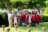 Brockhurst Primary School in Avery Lane, Gosport, have received a positive outcome in their recent Ofsted report. 

Pictured is:  (left) Shobana Kohli, headteacher, (middle) Amy Church, assistant headteacher and (right) Amy Hogan, assistant headteacher, with some of the children.

Picture: Sarah Standing (220525-7278)
