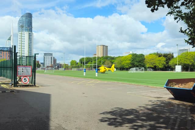 An air ambulance landed at HMS Temeraire, off Burnaby Road, around midday before crew went to The Hard