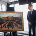 Two Royal Family paintings were unveiled to the public aboard HMS Queen Elizabeth in Portsmouth.