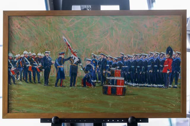 King Charles III presenting the colour to the Royal Navy.