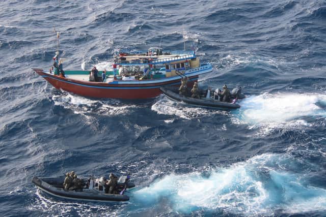 HMS Lancaster seized £30m worth of narcotics during a major drugs bust in the Arabian Sea. Pictured: Royal Marines of 42 Commando boarding the suspect vessel.