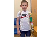 Tobi loves showing off his new bespoke prosthetic arm which has two pieces of real Lego in it.
