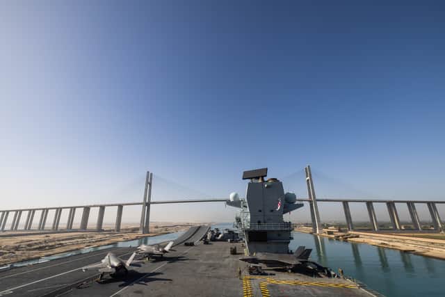 HMS Prince of Wales has transitioned through the Suez Canal and Red Sea. She has now reached the Indian Ocean. Pictured: The flight deck of HMS Prince of Wales as the ship goes under the Al Salam Bridge whilst transiting the Suez Canal en route to the Red Sea as part of Operation Highmast, on May 24, 2025.