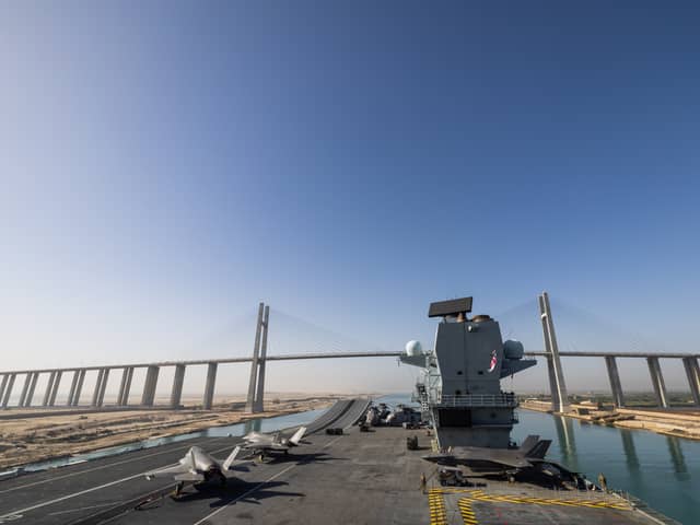 HMS Prince of Wales has transitioned through the Suez Canal and Red Sea. She has now reached the Indian Ocean. Pictured: The flight deck of HMS Prince of Wales as the ship goes under the Al Salam Bridge whilst transiting the Suez Canal en route to the Red Sea as part of Operation Highmast, on May 24, 2025.