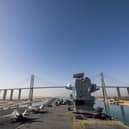 HMS Prince of Wales has transitioned through the Suez Canal and Red Sea. She has now reached the Indian Ocean. Pictured: The flight deck of HMS Prince of Wales as the ship goes under the Al Salam Bridge whilst transiting the Suez Canal en route to the Red Sea as part of Operation Highmast, on May 24, 2025.