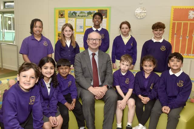 St Peter's Catholic Primary School has received a positive result in its recent Ofsted report. 

Pictured: Headteacher Richard Cunningham with some of the children at St Peter's Catholic Primary School in Stakes Hill Road, Waterlooville

Picture: Sarah Standing (030625-4016)