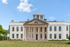 The listing says: "The house has been carefully preserved, a classical structure of perfect symmetry and proportion, with stuccoed elevations and sash windows."