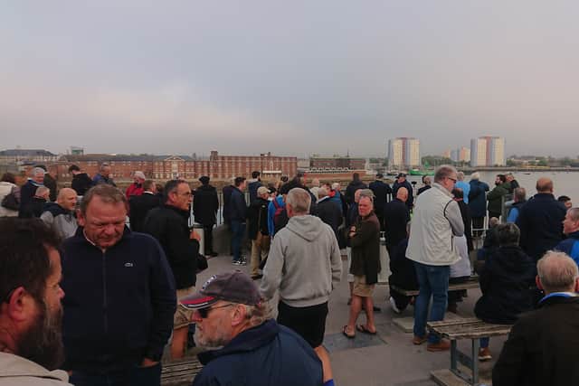 Crowds gathering on The Round Tower waiting for HMS Bristol to leave Portsmouth