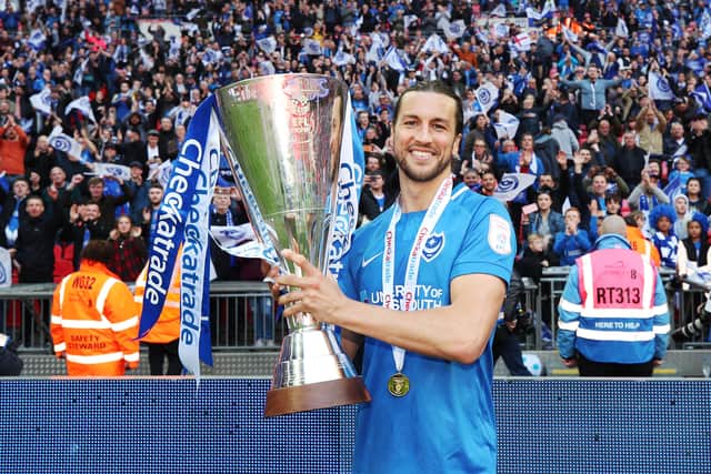 Christian Burgess with the Checkatrade Trophy at Wembley following Pompey's March 2019 victory over Sunderland. Picture: Joe Pepler
