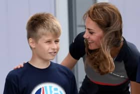 A teenage boy who received royal praise from the Prince and Princess of Wales for his winning design for the America's Cup World Series has taken his own life after getting into trouble with the police, an inquest has heard.


Pictured: Zak Kay, 10 at the time of the picture, with the Princess of Wales.


Picture: Paul Jacobs