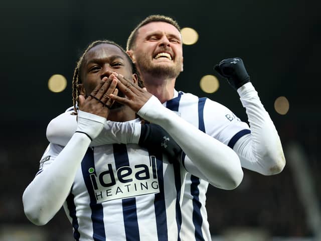 John Swift celebrates with West Brom team-mate Brandon Thomas-Asante during a game against Blackburn Rovers last season