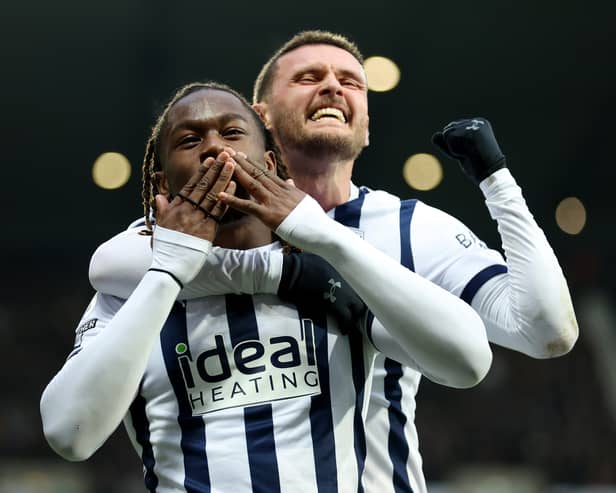 John Swift celebrates with West Brom team-mate Brandon Thomas-Asante during a game against Blackburn Rovers last season