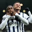 John Swift celebrates with West Brom team-mate Brandon Thomas-Asante during a game against Blackburn Rovers last season